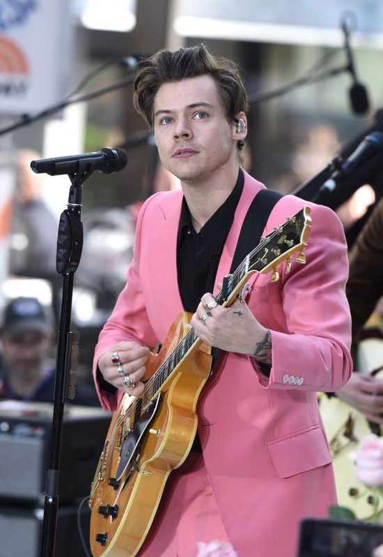 Harry Styles wearing an Edward Sexton pink suit