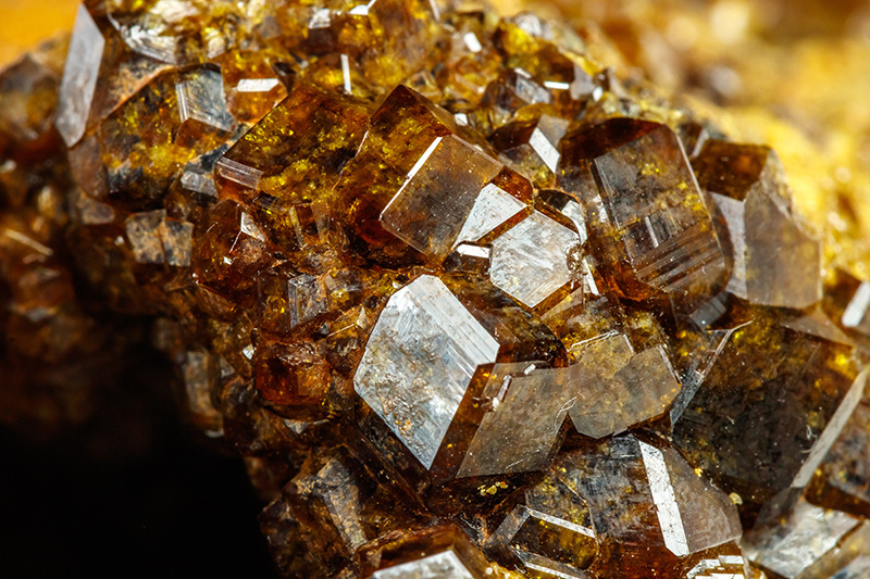 Macro mineral stone Garnet, Green Garnet, Epidote Grossular in the rock 