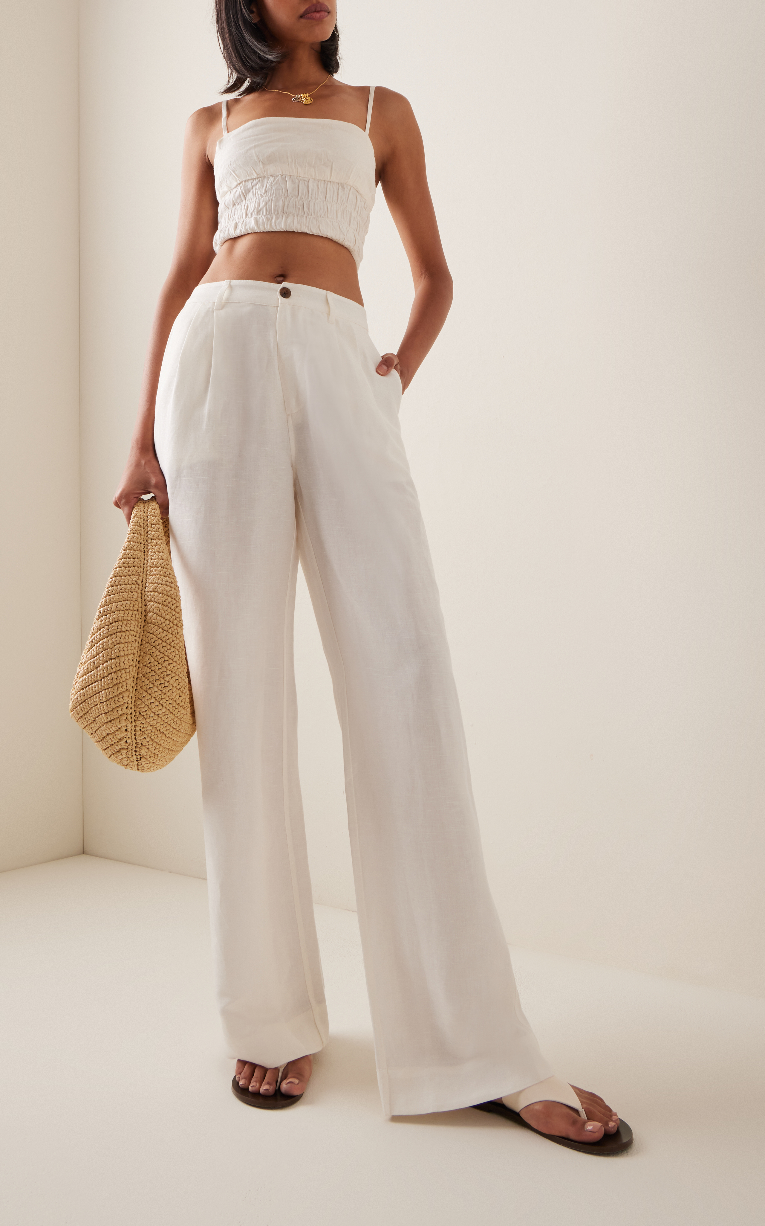 White linen pleated trousers