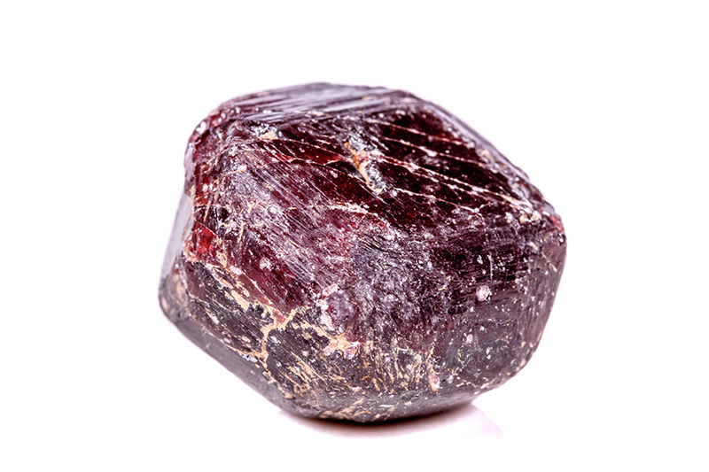 Macro of a mineral garnet stone