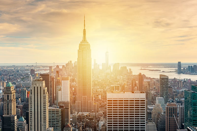 New York City skyline with urban skyscrapers at sunset