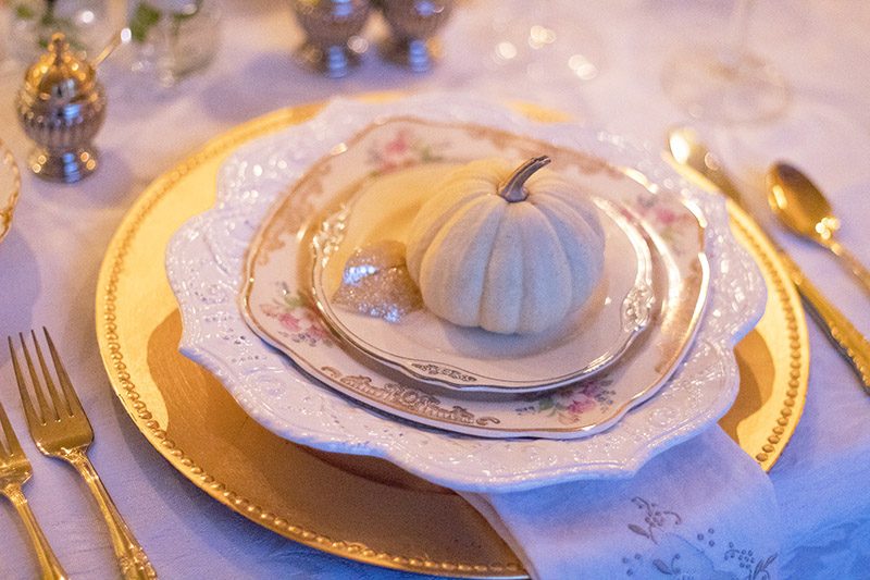 Christmas entertaining ideas: gold dinner table setting