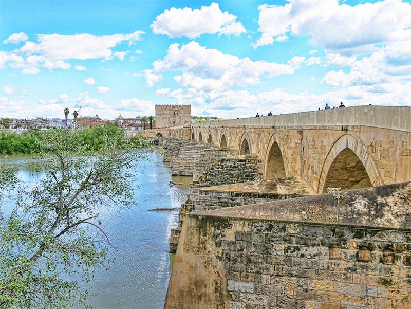 San Rafael Roman Bridge with the Torre de la Calahorra in the distance