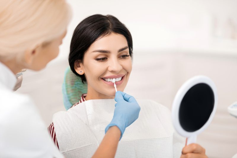 A woman undergoing a treatment at the dentist