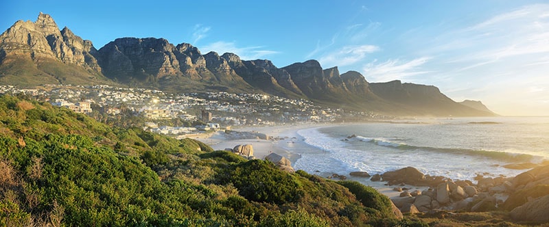 Camps Bay Beach in Cape Town with the Twelve Apostles mountains