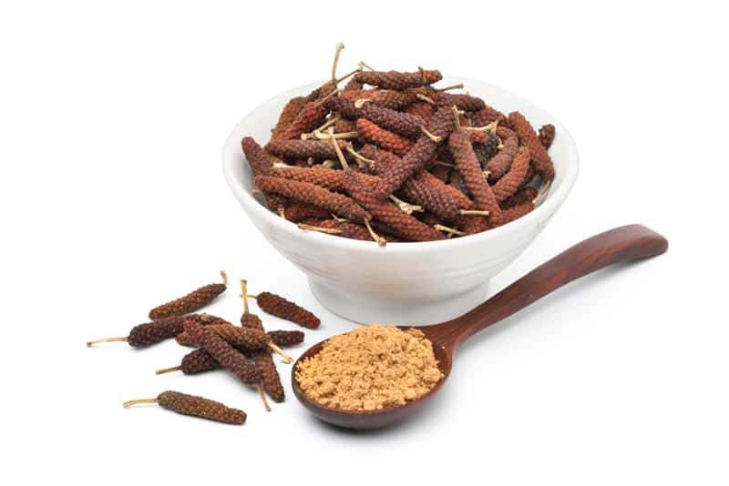 Dried long pepper and finely ground long pepper
