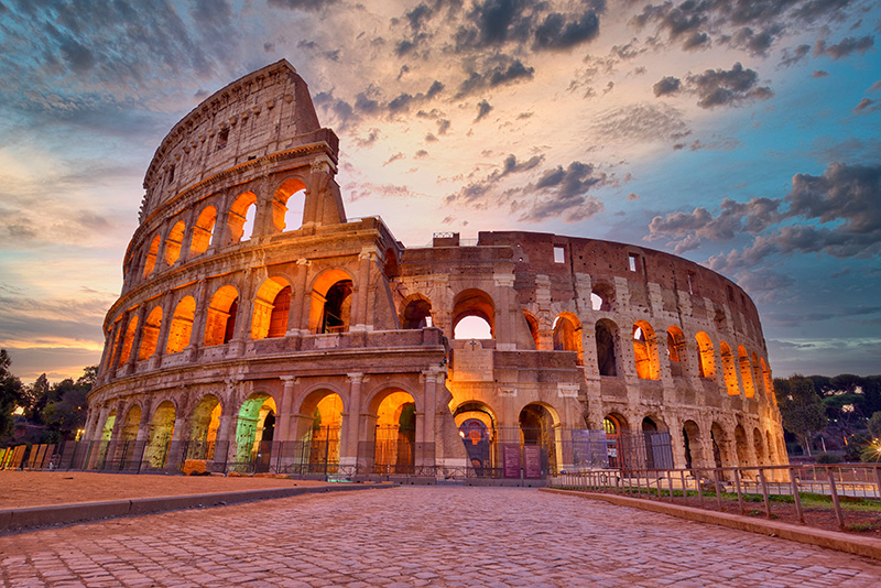 Colosseum at sunset, Rome. Rome best known architecture and land